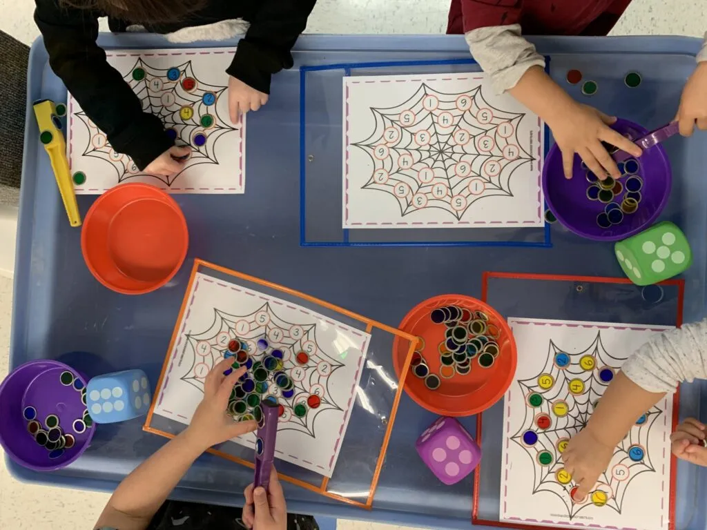 Math manipulatives spider web counting for halloween at Lessard Playschool
