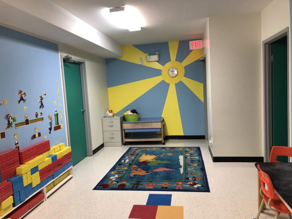 sunshine clock play area at Lessard Playschool preschool program west Edmonton